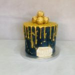 Gold and blue drip cake