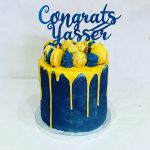 Blue and gold birthday cake